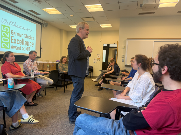 Per Urlaub, Director of Global Languages, congratulating students